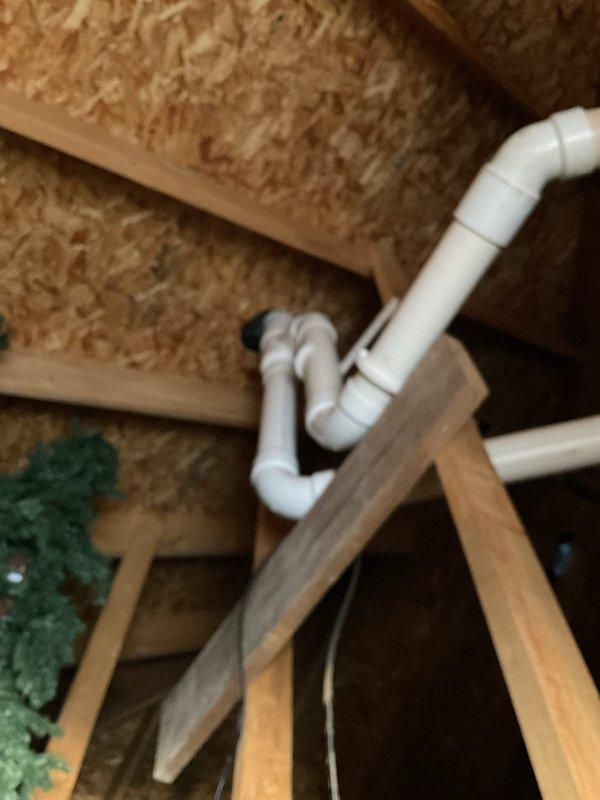 Performed preventive maintenance service on gas-fired tank-type water heater, including inspection of all components and connections. Investigated reported water intrusion occurring during rain events by examining water heater vent system in attic space, tracing vent piping through insulated areas and structural framing to determine if leak originated from interior penetration or above roof line. Customer enrolled in preventive maintenance program for ongoing system care.