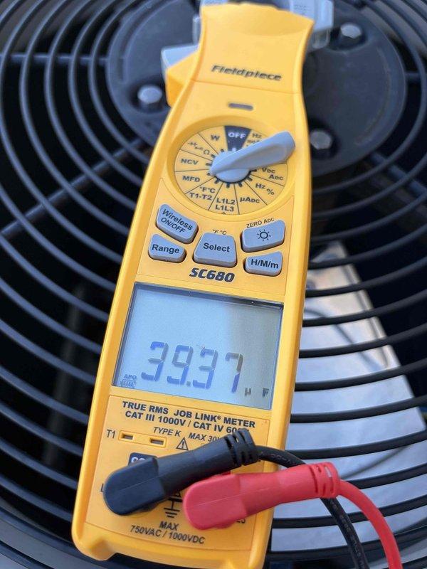 Completed final prepaid cooling system maintenance visit on Bryant HVAC unit. Performed comprehensive system inspection, verified proper operation of air handler and condenser components, and measured electrical parameters with clamp meter showing 39.97 amp draw on condenser fan motor, which is within normal operating range. All equipment functioning properly with no deficiencies noted.