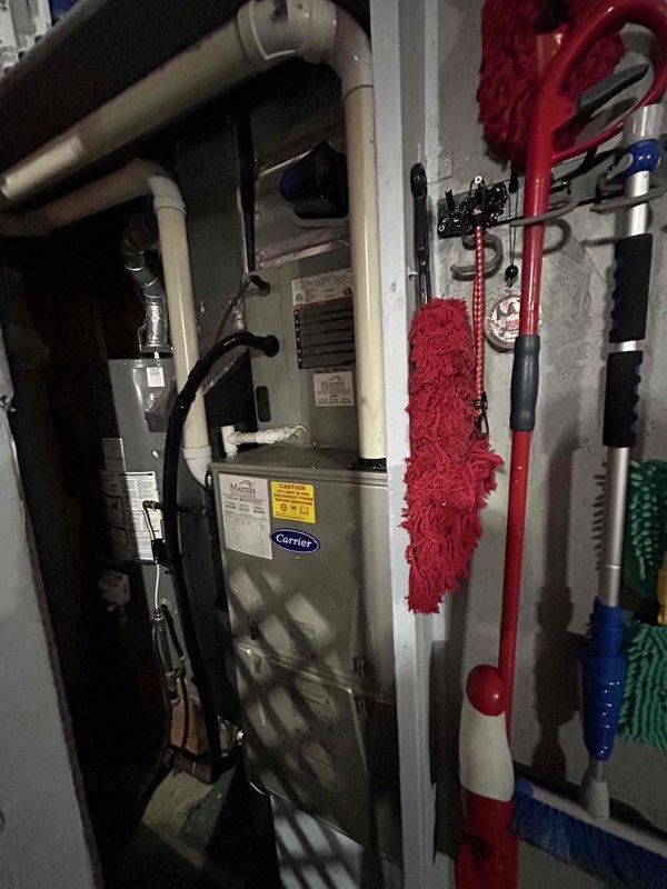 Performed estimate for air conditioning system replacement at residential property. Existing Carrier furnace in garage is newer and in good working condition, requiring no replacement. Current AC unit was operational but experiencing inadequate cooling capacity during peak temperature days, indicating declining performance and efficiency. Provided replacement options for outdoor condensing unit and associated components while retaining existing furnace and ductwork infrastructure.