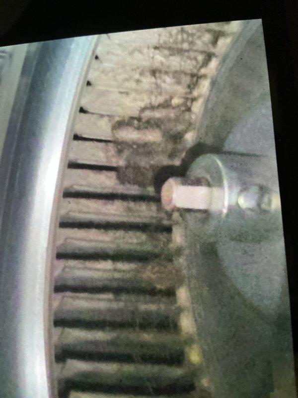 Completed first preventive maintenance visit on residential cooling system. Inspected evaporator coil and found moderate to heavy accumulation of dust and debris on fins and surfaces, typical of unit requiring service. Removed and inspected air filter, which showed significant loading with particulate matter indicating proper filtration but need for replacement. Documented equipment condition with photos showing dirty evaporator coil with buildup between fins and used air filter with dark discoloration throughout pleated media. Performed standard maintenance procedures per manufacturer specifications. System operational upon completion. Customer notified regarding heating system maintenance scheduling.