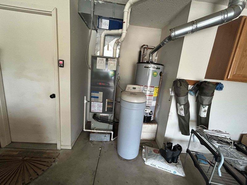 Responded to service call for HVAC system experiencing multiple issues requiring immediate attention. Conducted comprehensive assessment of existing residential heating and cooling equipment, including outdoor condensing unit and indoor air handler installation. Evaluated current system performance, documented equipment condition through detailed photography, and provided estimate for complete HVAC system replacement to address identified deficiencies and restore proper climate control functionality.