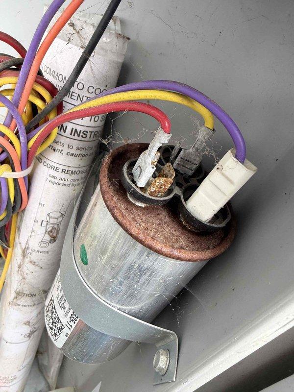 Completed comprehensive tune-up maintenance on residential AC unit. Performed thorough inspection of electrical components including terminal connections, capacitor, and control wiring. Capacitor showed signs of age with surface corrosion noted on terminals; all electrical connections were verified secure and system tested for proper operation.