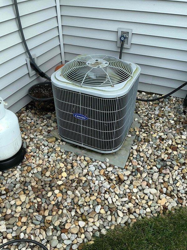 Completed scheduled prepaid cooling maintenance visit on residential Carrier HVAC system. Performed comprehensive inspection of indoor furnace unit located in utility closet and outdoor condenser unit, verified proper operation of all components including fan assembly, condenser coils, and control systems. All equipment found operating within normal parameters with no deficiencies noted.