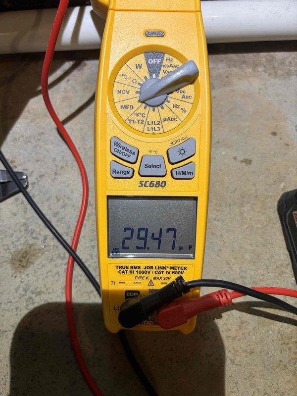 Completed first prepaid preventive maintenance visit on geothermal cooling system. Performed comprehensive system diagnostics including electrical measurements and temperature differential readings across the unit. All operating parameters measured within manufacturer specifications, with supply air temperature differential of 5.8°F and line voltage reading of 294.7V confirmed normal for system operation.