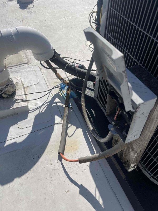 Responded to no cooling complaint on newly installed rooftop HVAC system. Upon arrival, verified outdoor condensing unit and associated electrical components were properly installed with correct refrigerant line connections and condensate drainage in place. System inspected and found to be operational with all connections secure and equipment functioning as designed.