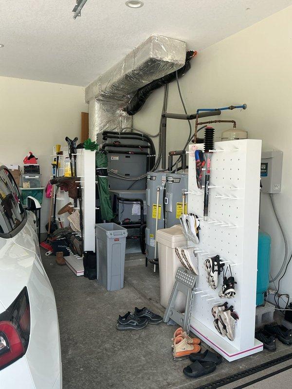 Conducted on-site evaluation for mini split installation in garage space. Assessed existing electrical panel capacity and circuit availability to support new mini split system. Evaluated garage layout, wall space, and proximity to existing HVAC equipment and water heater to determine optimal placement for indoor air handler unit and outdoor condenser. Documented current electrical infrastructure and mechanical equipment locations to provide accurate installation estimate.