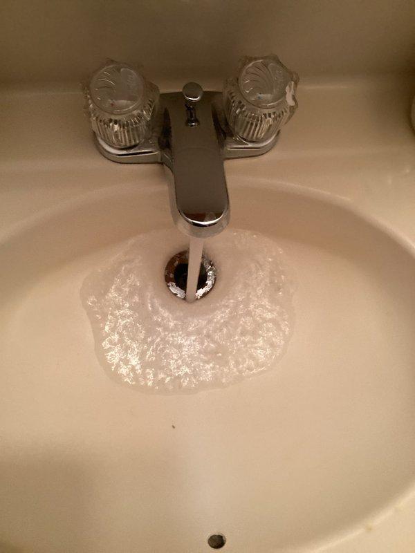 Performed scheduled maintenance on tanked gas water heater located in basement, including complete system flush to remove sediment buildup and ensure optimal performance. Tested all safety controls, verified proper venting, and confirmed unit operation within manufacturer specifications. Water quality testing conducted at multiple fixtures throughout the home revealed evidence of mineral deposits and rust staining at bathroom fixtures, indicating potential anode rod degradation in water heater that may require future attention.
