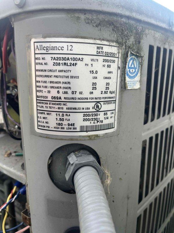 Responded to no cooling complaint on residential split system with American Standard Allegiance 12 outdoor unit (Model 7A2030A100A2, manufactured 02/2001, 23+ years old). Upon arrival, customer reported unit running but not providing cooling to home. Performed diagnostic evaluation of outdoor condensing unit and indoor air handler system. Documented equipment condition with photos showing significant age-related wear, outdoor environmental exposure, dirt accumulation on condenser housing, and overall degradation consistent with unit exceeding expected service life. System assessment revealed equipment operating beyond manufacturer's typical 15-20 year lifespan, indicating high probability of component failure or refrigerant system issues. Given the age and condition of the unit, discussed replacement options with customer as most cost-effective long-term solution versus investing in repairs on equipment that has exceeded its useful service life.