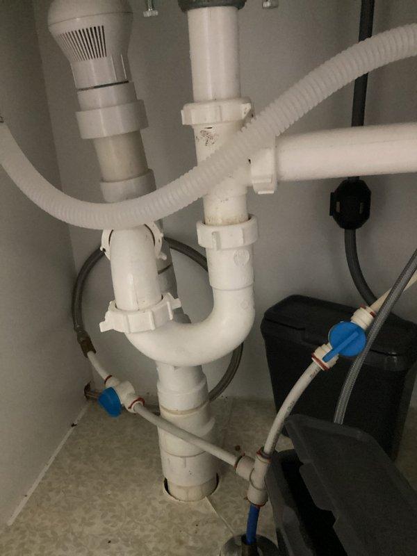 Performed routine maintenance on tanked water heater located in garage, including complete flush of sediment buildup from tank to maintain efficiency and extend unit lifespan. Inspected plumbing connections, drain valve operation, and overall system condition. Unit flushed successfully with no leaks detected and all components functioning properly upon completion.