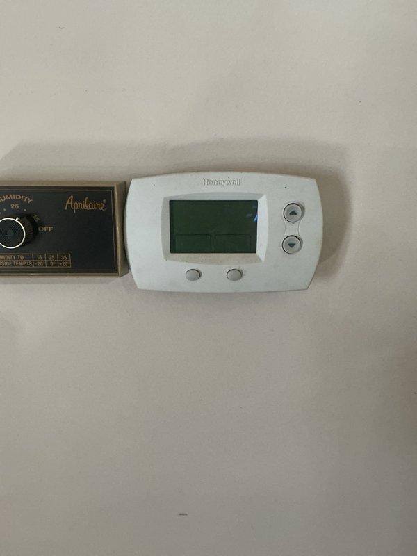Performed on-site assessment for gas furnace replacement following flood damage to existing unit. Took detailed measurements of current HVAC equipment and mechanical room layout to determine proper sizing and clearance requirements for new furnace installation. Documented existing system configuration including humidifier control and thermostat setup for replacement planning and provided comprehensive estimate for new gas furnace system.