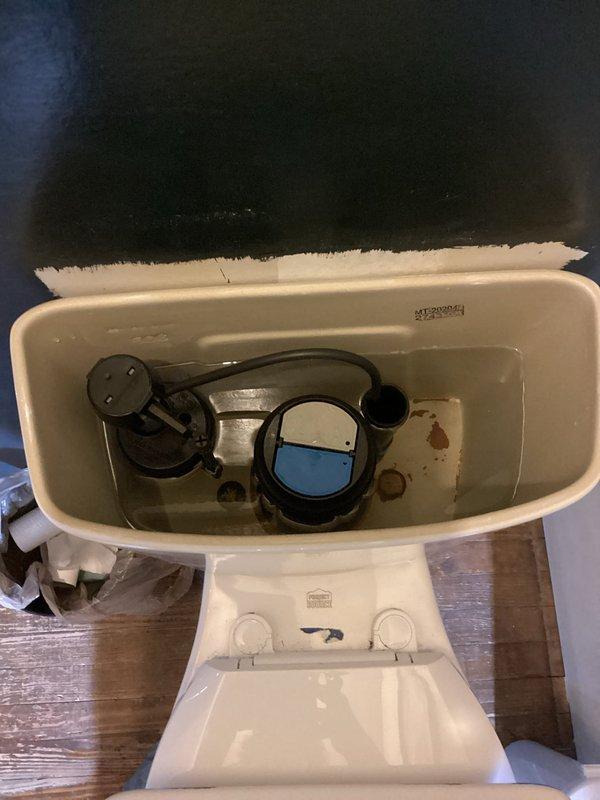 Performed routine plumbing maintenance inspection and tanked water heater flush as scheduled. Upon arrival, conducted comprehensive assessment of plumbing fixtures throughout the property. Inspected toilet tank components, noting functional flush valve assembly and fill valve mechanism with visible mineral deposits indicating normal wear. Tested water flow at bathroom sink faucet to verify proper operation and pressure. Completed standard water heater maintenance procedures including tank drainage and flushing to remove sediment buildup, ensuring optimal heating efficiency and extending equipment lifespan through 2027 maintenance cycle.