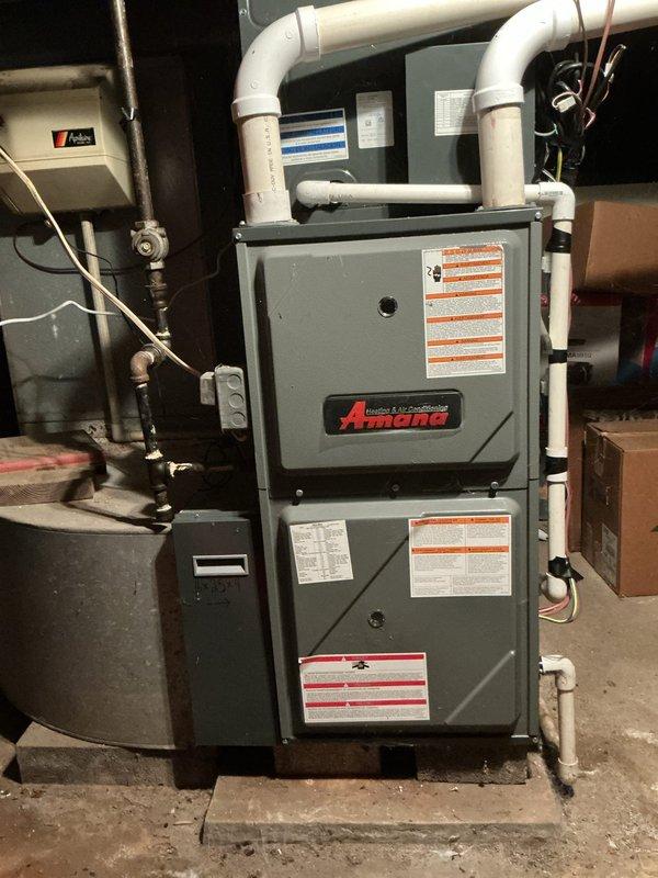 Performed comprehensive tune-up and safety inspection on Amana gas furnace system. Inspected all mechanical and electrical components, verified proper operation of burner assembly, heat exchanger, blower motor, and gas valve. Confirmed venting system integrity including PVC intake and exhaust pipes, checked condensate drainage, tested all safety controls, and verified proper gas pressure and combustion efficiency. System operating within manufacturer specifications with no issues identified.