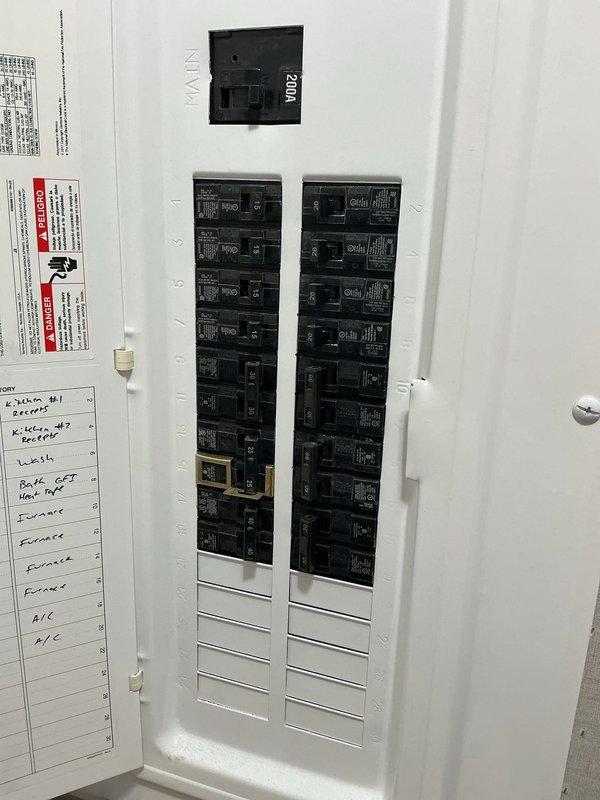 Conducted estimate visit for heat pump system replacement to convert existing electric heat system. Evaluated current electrical infrastructure including 200A main panel and existing circuit configurations for heat pump compatibility. Assessed installation location and provided customer with equipment options and specifications for transitioning from electric resistance heating to heat pump technology for improved energy efficiency.