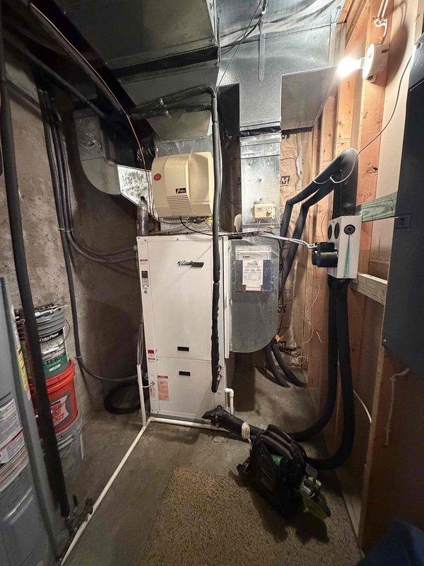 Completed scheduled maintenance tune-up on 20-year-old geothermal heating and cooling system. Performed comprehensive system inspection, verified operational parameters, and confirmed all components functioning within normal specifications. System currently operating properly with no issues identified or corrective actions required.
