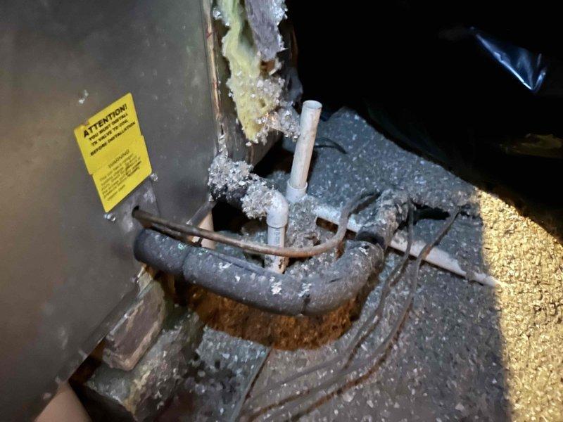 Responded to no cooling complaint and diagnosed air conditioning system with low refrigerant levels indicating possible leak in the system. Conducted comprehensive evaluation of HVAC equipment to provide replacement estimate, documenting existing unit condition and installation requirements. Generated detailed proposal for complete system replacement due to recurring refrigerant loss and previous repair history, including assessment of exterior condensing unit location and interior air handler accessibility.