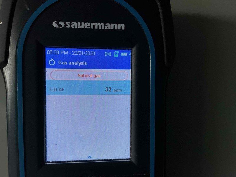 Completed comprehensive AC tune-up service on natural gas system. Performed combustion analysis using gas analyzer, recording optimal efficiency readings of 97.9% with CO levels at 20 ppm and CO2 at 7.29%. Follow-up measurement confirmed CO air-free reading of 32 ppm, indicating proper combustion and system operation within acceptable parameters.