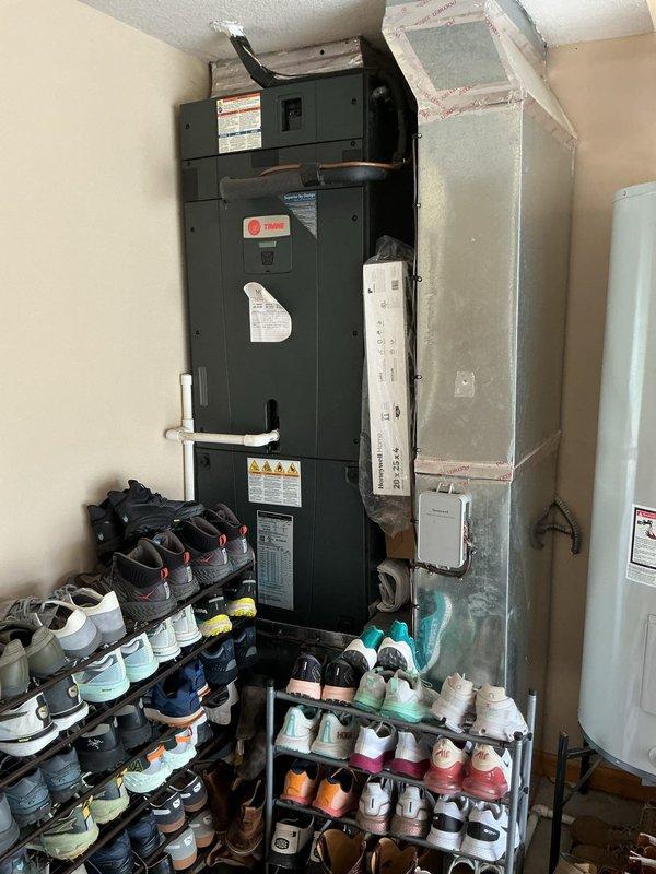 Completed cooling system prepaid maintenance tune-up on Trane air handling unit located in utility room. Performed comprehensive inspection of system components, verified proper operation of all mechanical and electrical elements, and documented equipment condition with photographs. Gas furnace cleaning was addressed on a separate service ticket as requested.