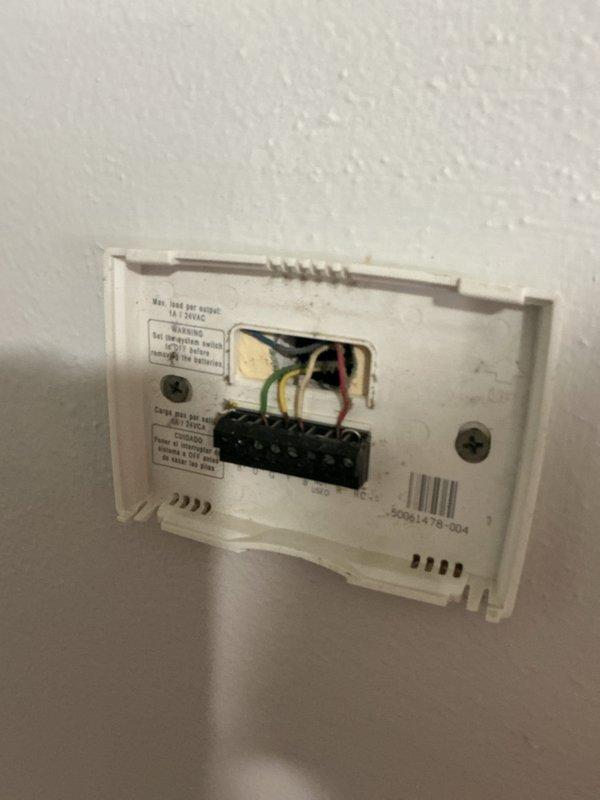 Conducted comprehensive assessment of existing 22-year-old Standard brand gas furnace for complete HVAC system replacement estimate. Property currently relies on window air conditioning unit with no central cooling system installed. Evaluated mechanical room conditions, existing ductwork configuration, thermostat wiring, and utility connections to determine specifications for new gas furnace and air conditioning system installation. Documented equipment model information, electrical requirements, and noted environmental concerns including active wasp nest in mechanical space requiring remediation prior to installation.