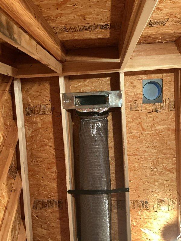 Installed customer-supplied mini-split system for wine room application. Ran and secured 8-inch supply duct and 10-inch return air duct through framed wall cavities using flexible insulated ductwork with proper strapping at intervals. Installed metal vent boots and plenums at termination points, cutting appropriate openings in OSB wall panels for duct penetrations and ensuring proper sealing of all connections for optimal airflow and system efficiency.