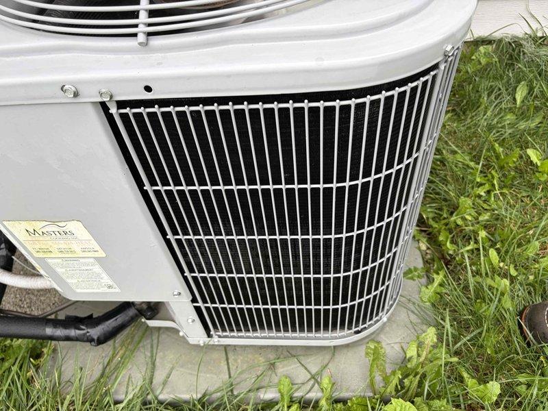Performed complete cooling system tune-up on outdoor condenser unit. Inspected condenser coil, fan motor, and electrical components for proper operation. Evaluated thermostat concern regarding potential vacuum mode malfunction and verified system cycling and temperature control functionality.