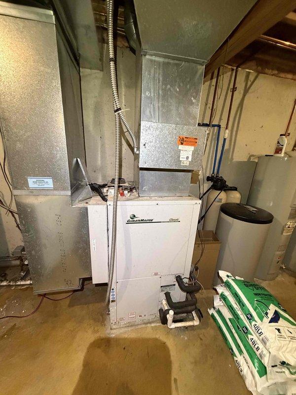 Completed heating season tune-up on geothermal system. Inspected air handler unit, verified proper airflow through heat exchanger, and confirmed system operational temperature at 85°F. All equipment components found in satisfactory working condition with no issues identified during inspection.