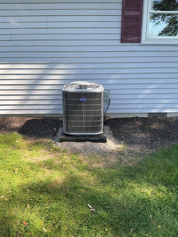 Completed full HVAC system replacement including installation of Carrier 59TP7A060V17-16 Performance 97 Series two-stage gas furnace with 60,000 BTU capacity, Carrier 26SCA424N003 Comfort Series single-stage 2-ton air conditioner, and Carrier CVAVA3017XMA evaporator coil. Removed and recycled existing equipment, reconnected to existing supply and return ductwork, and installed new electrical disconnect and whip for outdoor unit. Flushed, pressure tested, and reconnected existing refrigerant line set to new condenser unit positioned on new 2-inch PVC pad with pea gravel base. Installed Honeywell FocusPro S200 thermostat and provided system operation instruction. Completed warranty registration, post-installation quality assurance inspection, and customer walkthrough of new system.