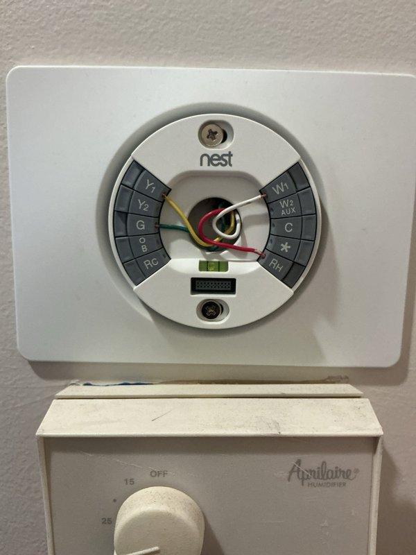 Conducted on-site assessment for furnace replacement in basement installation. Documented existing system configuration including Nest thermostat with Aprilaire humidistat, reviewed current wiring connections and HVAC components, and took measurements of equipment and ductwork to prepare comprehensive replacement estimate.
