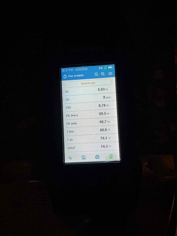 Performed a heating tune-up on a Carrier Infinity gas furnace with a stacked coil cabinet, inspecting the unit, condensate drain, venting, and ductwork connections with no visible rust, frost, or damage noted. Conducted a combustion analysis on natural gas, recording O2 at 8.83%, CO at 8 ppm, CO2 at 6.78%, flue temperature of 88.6°F, and combustion efficiency of 89.5%, confirming the furnace is operating safely and within normal parameters.