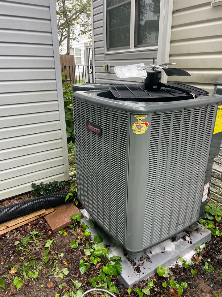 Chesapeake Beach, MD - Rinsing condenser coils on an Amana system in Chesapeake Beach Chesapeake Beach, MD - Rinsing condenser coils on an Amana system in Chesapeake Beach