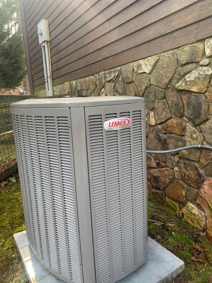 Preventative spring maintenance on Lennox heat pump air conditioner 