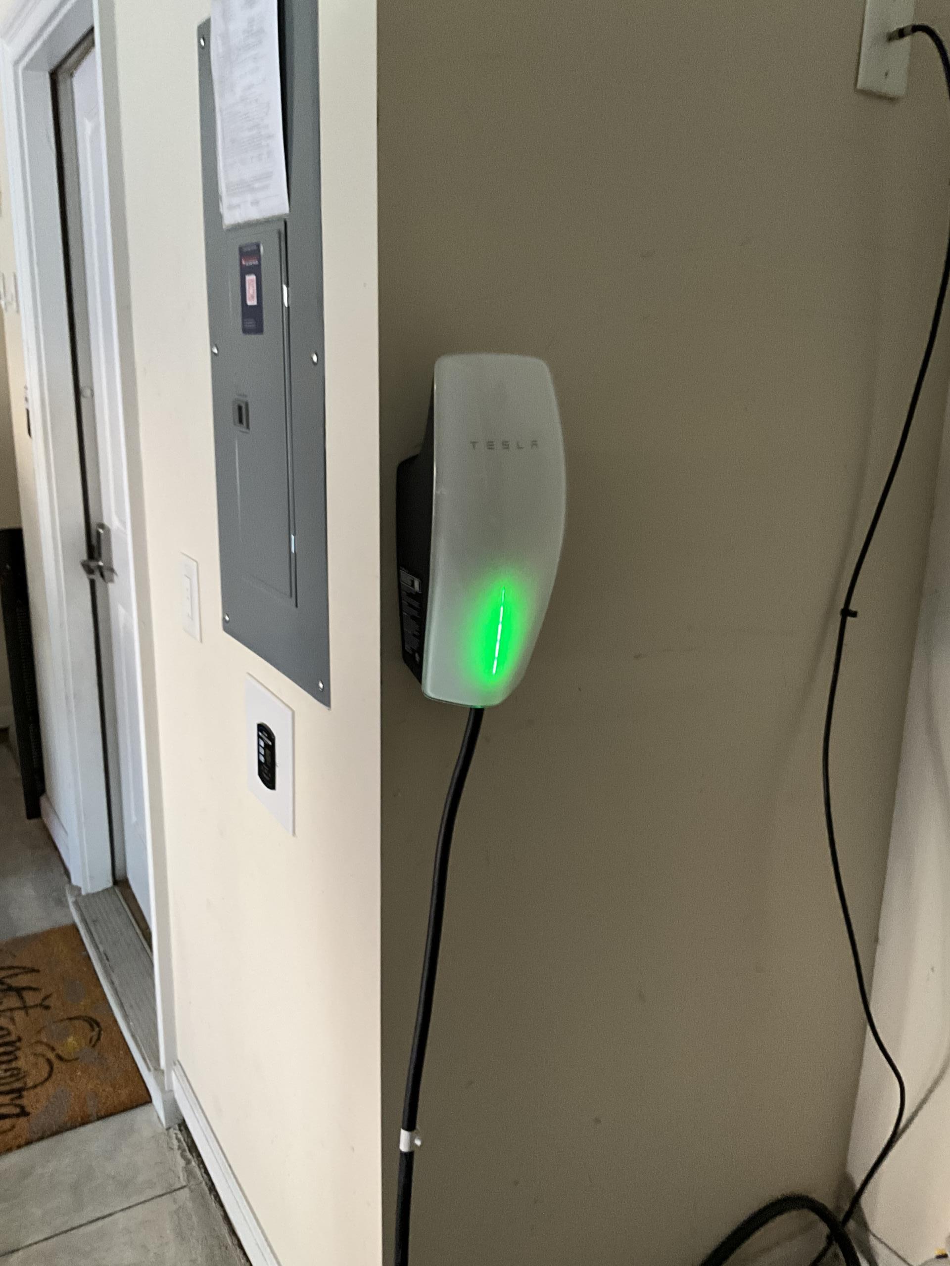 I installed a new Tesla hardwired electric vehicle charging station, ensuring it met all local electrical codes and safety standards. The process began with a thorough assessment of the site to determine the optimal placement for the charging station. I then ran a dedicated 40-amp circuit from the main electrical panel to the installation site, ensuring all wiring was done safely and efficiently. The charging station was mounted securely, and I connected it to the electrical system, followed by rigorous testing to confirm proper functionality. Finally, I provided the client with detailed instructions on how to use the charging station and its maintenance requirements.