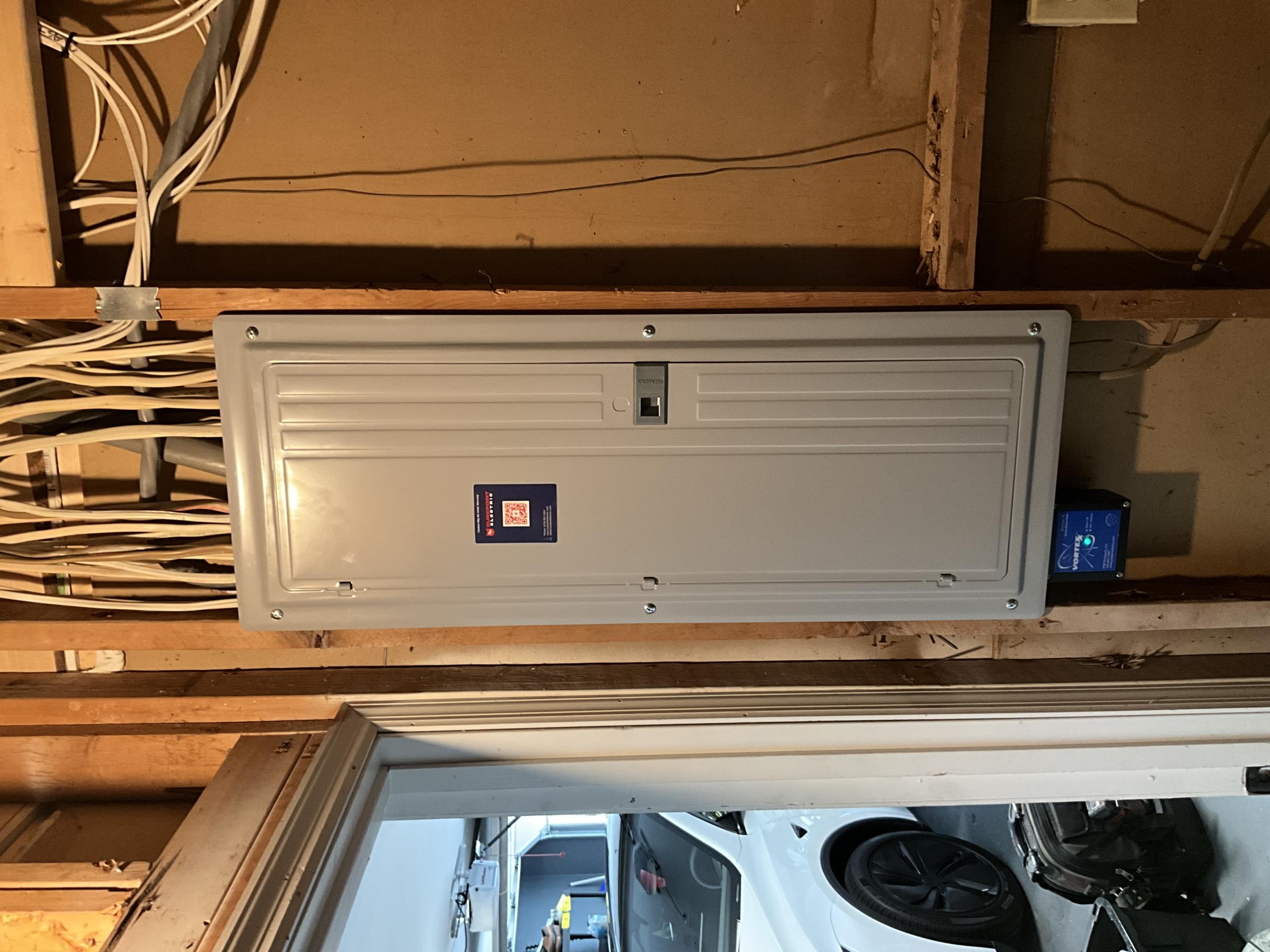 I installed a dedicated circuit for a Level 2 electric vehicle charging station, ensuring it met all safety and efficiency standards. The project involved replacing the existing 200 amp main breaker panel with a new one, complete with all new UL-listed circuit breakers. Each circuit was meticulously re-identified for clarity and safety. Additionally, I installed a whole home surge protection system to safeguard the entire electrical infrastructure from power surges. The work was performed with precision, ensuring all components were properly integrated and tested for optimal performance.