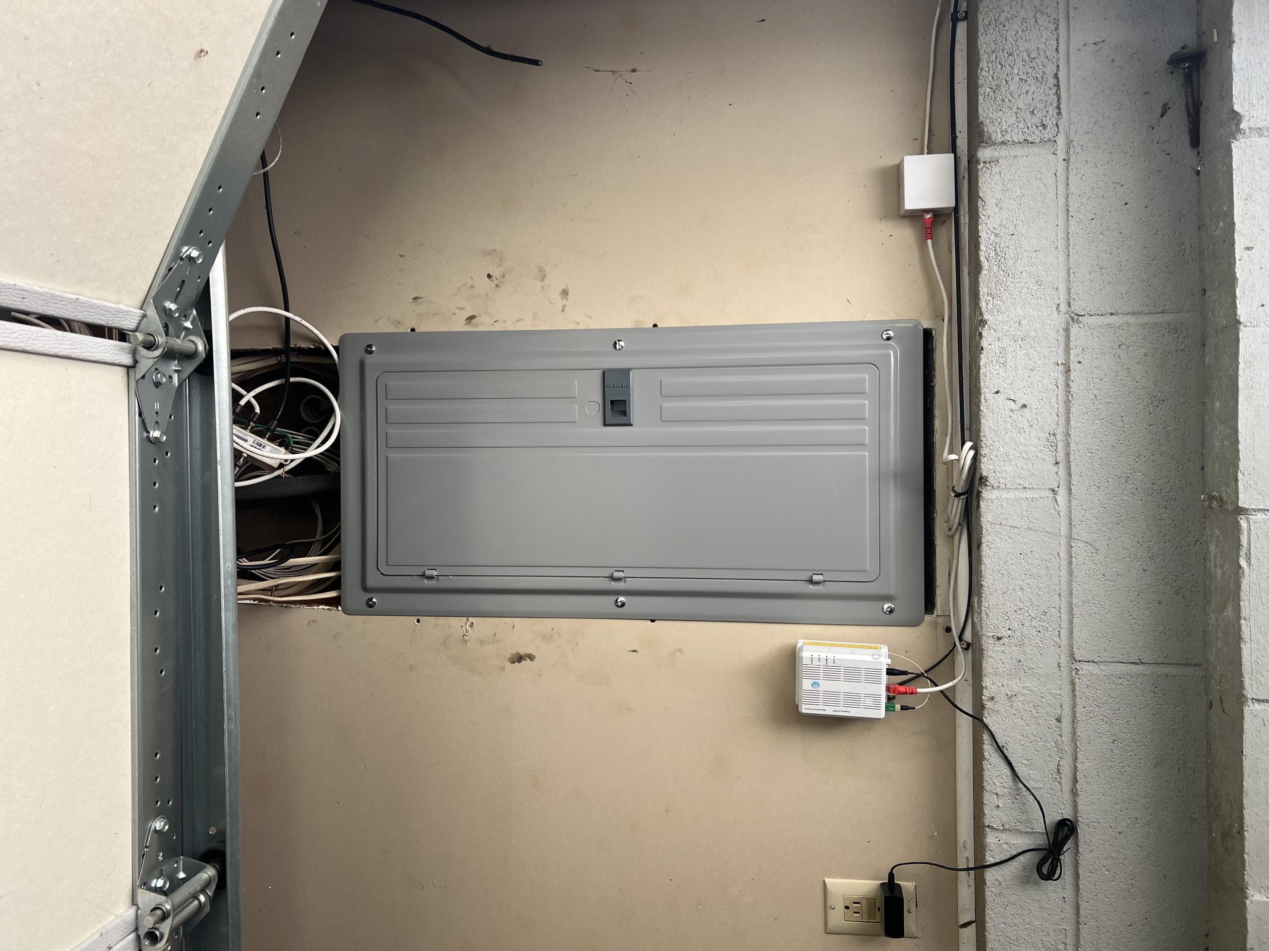 I replaced the interior main load center, ensuring all new components met UL standards. This involved installing a full set of UL-listed circuit breakers, enhancing safety and efficiency. Additionally, I installed a whole home surge protection system to safeguard all electrical appliances and devices from power surges. The new system was configured to provide optimal protection and was tested to ensure proper functionality. This upgrade significantly improved the electrical system's reliability and resilience against potential electrical disturbances.