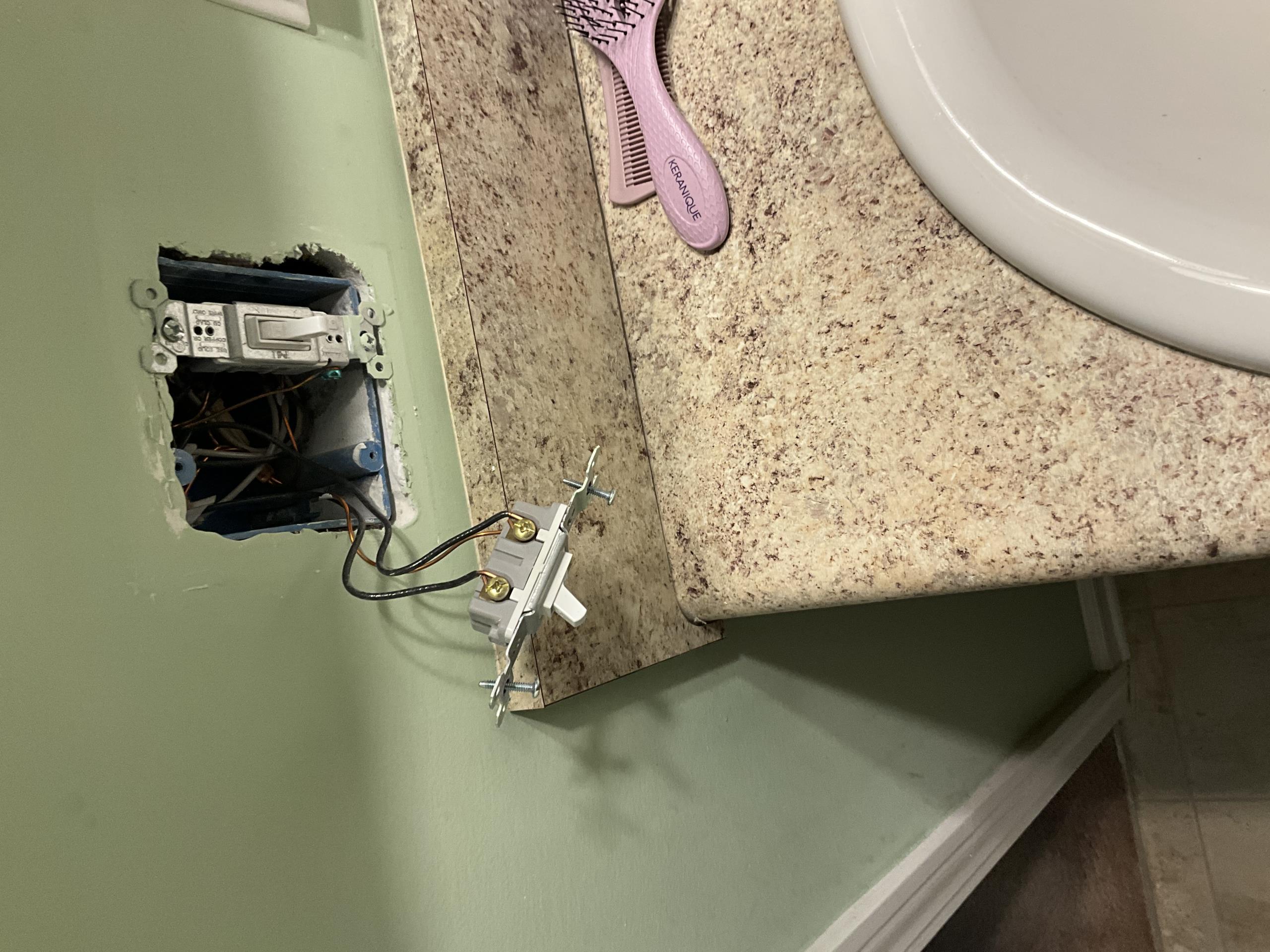 Upon arrival, I conducted a thorough diagnostic evaluation of the bathroom lighting fixture due to flickering reports. I inspected the wiring and switch connections, finding no defects. Further examination revealed that low-quality Great Value bulbs were causing intermittent flickering due to poor socket contact. I replaced these with higher-quality LED EcoSmart bulbs, ensuring proper installation and secure contact. After testing, the flickering was resolved, and the lighting system operated normally and safely.