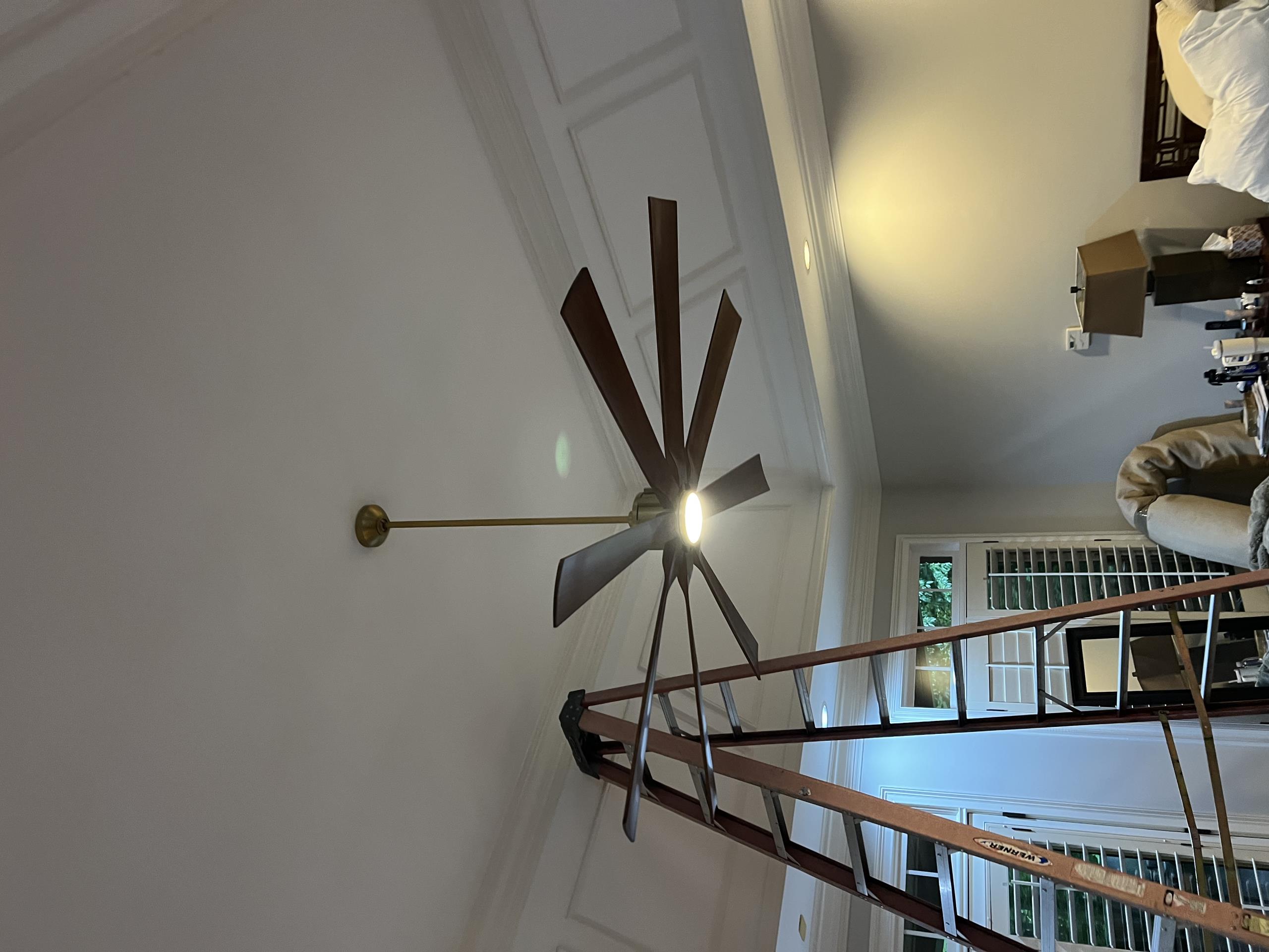 Today, I installed two fan-rated boxes, one in the bedroom and one in the dining room. Additionally, I hung a chandelier in the dining room, a ceiling fan in the living room, and another chandelier in the informal dining area. A fan was also installed in the master bedroom. During the work, I identified a loose neutral and several master-slave switch concerns. I temporarily fixed a faulty three-way switch in the master bedroom. The living room light fixture was hung but did not function due to a potential transmitter issue. The customer refused to pay for the completed work.