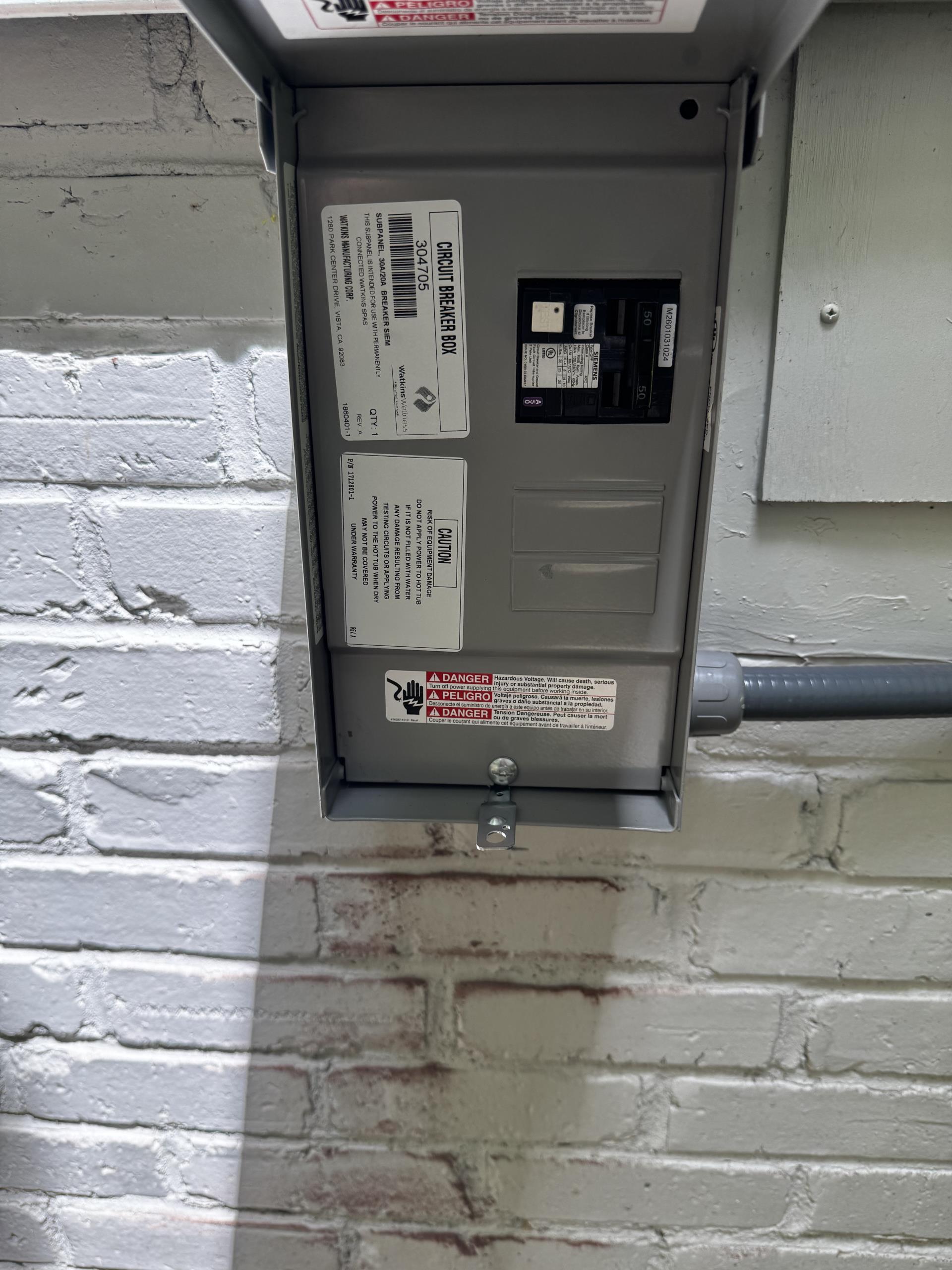 We began by assessing the existing electrical panel to determine the best available space for a dedicated line. This involved careful planning to ensure optimal efficiency and safety. Next, we accessed the crawl space, navigating through the area to prepare for the wiring. We then ran the dedicated line from the panel, ensuring all connections were secure and compliant with electrical codes. Once the line was successfully installed, we mounted the customer-provided disconnect, ensuring it was easily accessible and properly secured. If necessary, we installed a new whip, measuring approximately 25 feet to reach the hot tub. Finally, we completed the connection to the hot tub on the same day, ensuring everything was functioning correctly and safely.