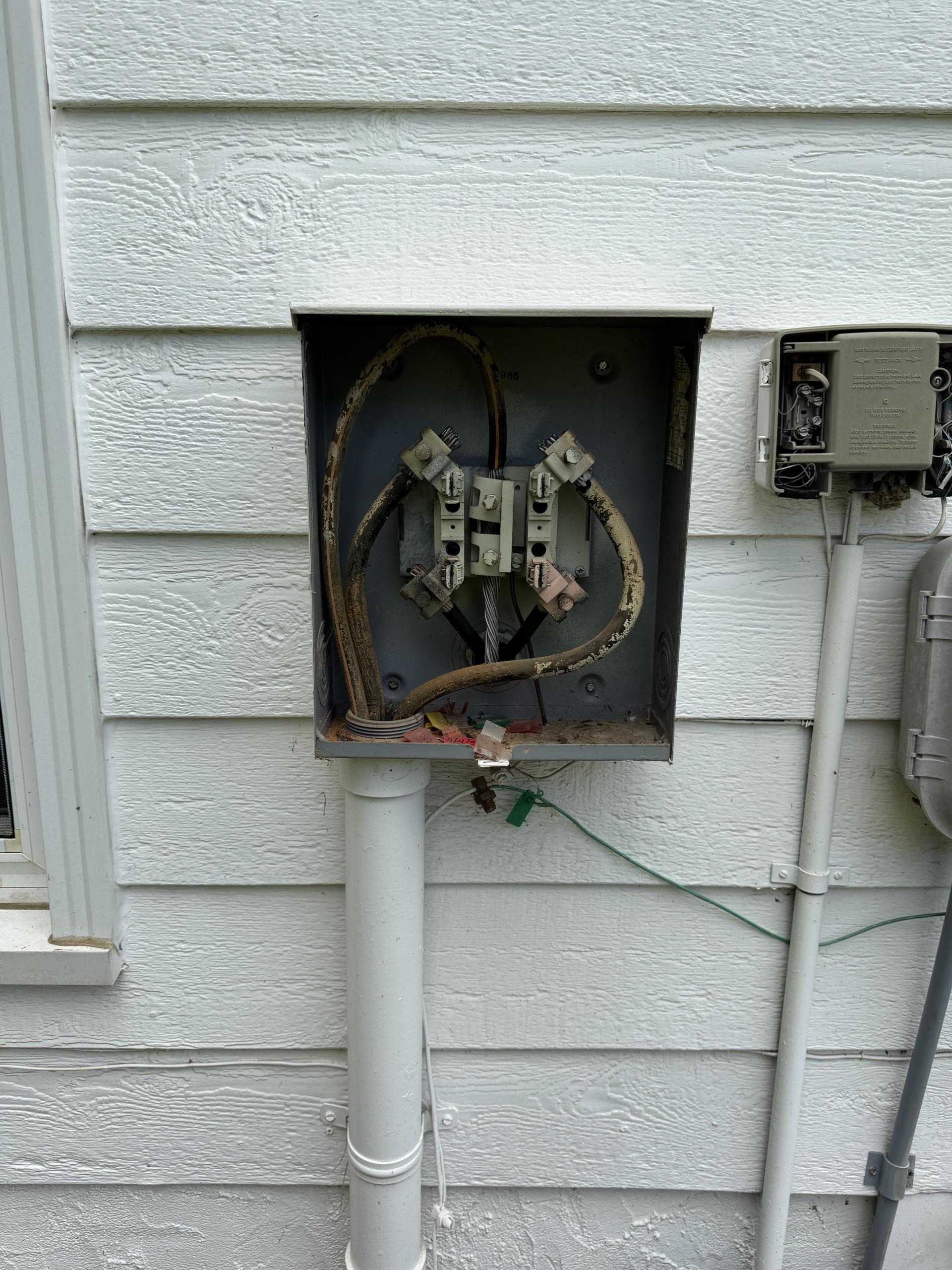 We installed a new 120/240-volt, 200-amp electrical service, including all necessary equipment and connections. A complete grounding electrode system with two ground rods was installed to meet code. A Type 1 whole-home surge protection device was added at the service equipment. A hardwired, interconnected smoke alarm system was installed in all required areas. Permits were obtained, and final inspections were coordinated. AFCI breakers and neutral/ground isolation corrections are not included unless required by inspection.