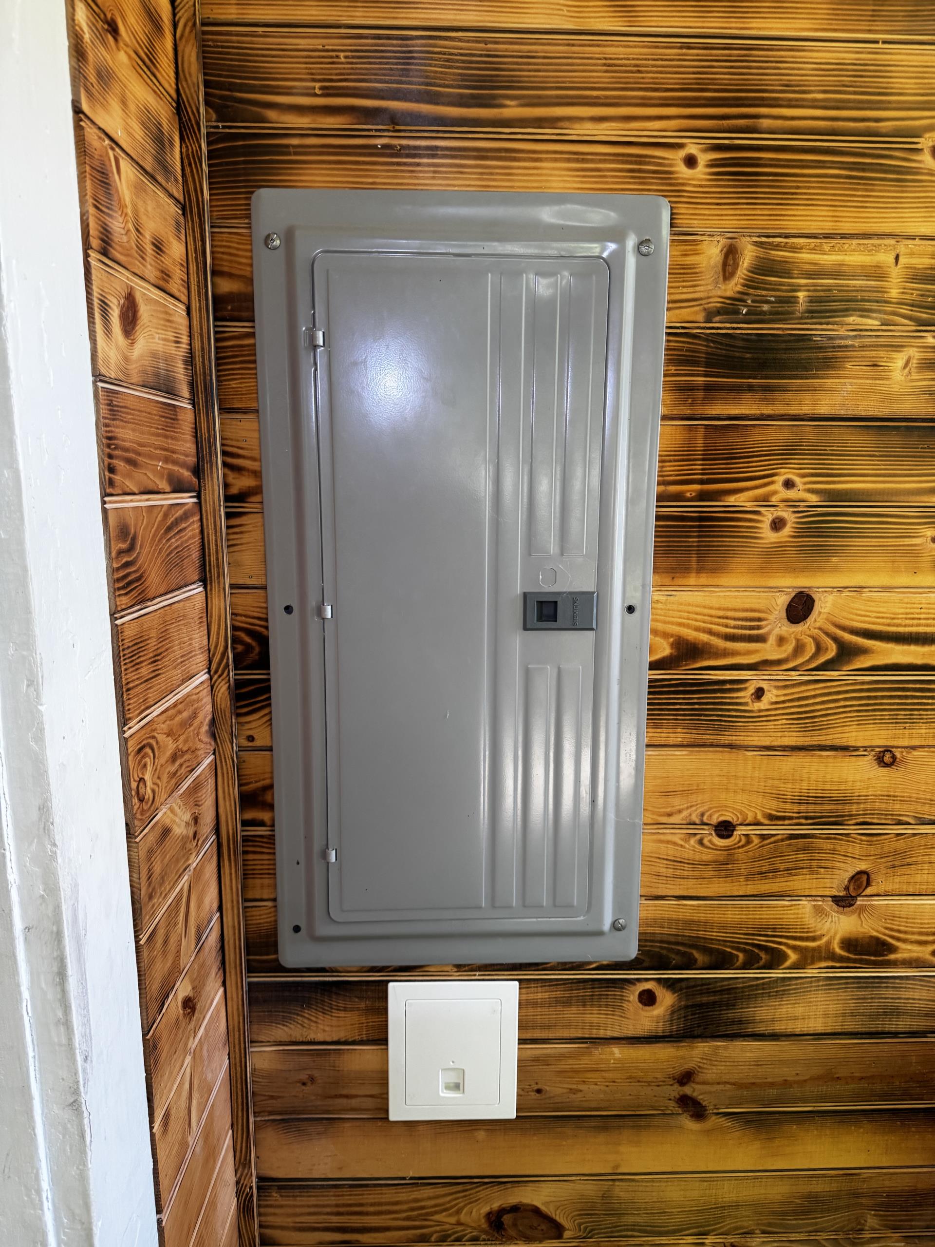 I completed a comprehensive electrical upgrade, starting with the replacement of the existing outdoor meter enclosure with a new 150amp rated unit, ensuring it included a proper emergency/service disconnect. The corroded SEU service entrance cable was replaced with a new 2/0 SER cable, equipped with necessary protections to prevent future corrosion. A grounding electrode system was installed in strict compliance with local and national codes. Additionally, I installed arc fault circuit protection for all 120-volt circuits and hardwired and interconnected smoke alarms. All work was completed with the necessary permits and inspections.