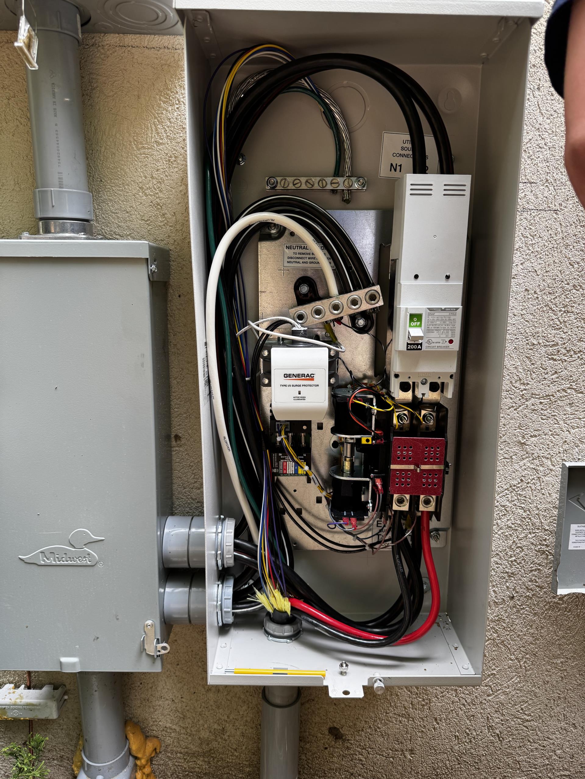 We completed the installation of a 26kW Generac whole-home generator, including an outdoor automatic transfer switch and two load-shed modules. The generator pad was constructed with river rock, and the generator was installed as per the provided photo. Our team handled all electrical work, and we coordinated with the plumber to ensure seamless completion. The gas line installation from the meter to the generator was also completed. Note that any plumbing work, gas service modifications, permits, or fees are the homeowner's responsibility. We appreciate your trust in our services.