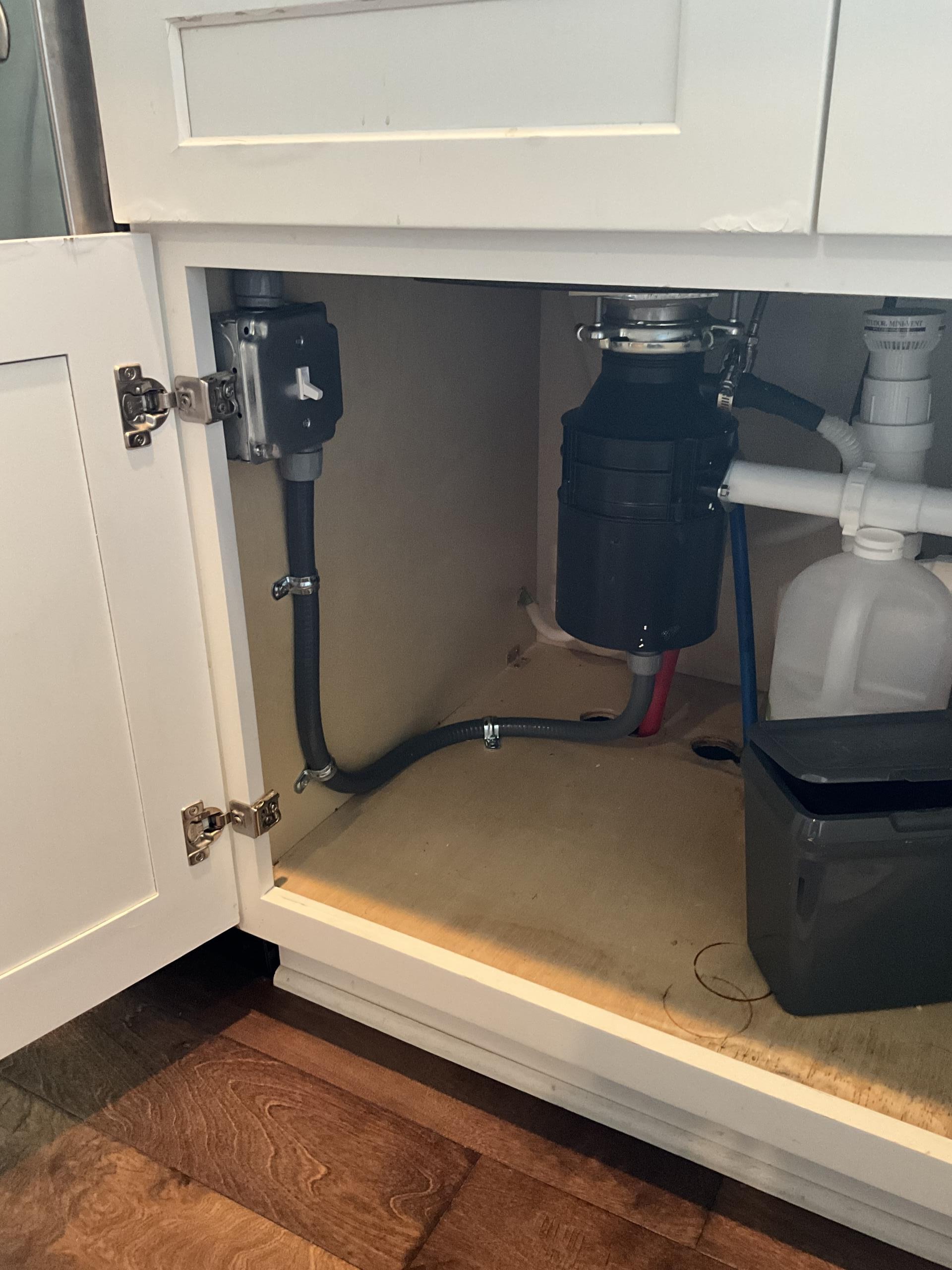We installed new wiring and a switch for the garbage disposal, ensuring it was securely mounted under the sink. A dimmer switch in the dining room was replaced, and an unknown switch location was traced, with the space filled if dormant. Circuit diagnostics revealed a faulty fan receiver in the bedroom, leading to power loss. Additionally, a whole home surge protection system was installed for enhanced safety.