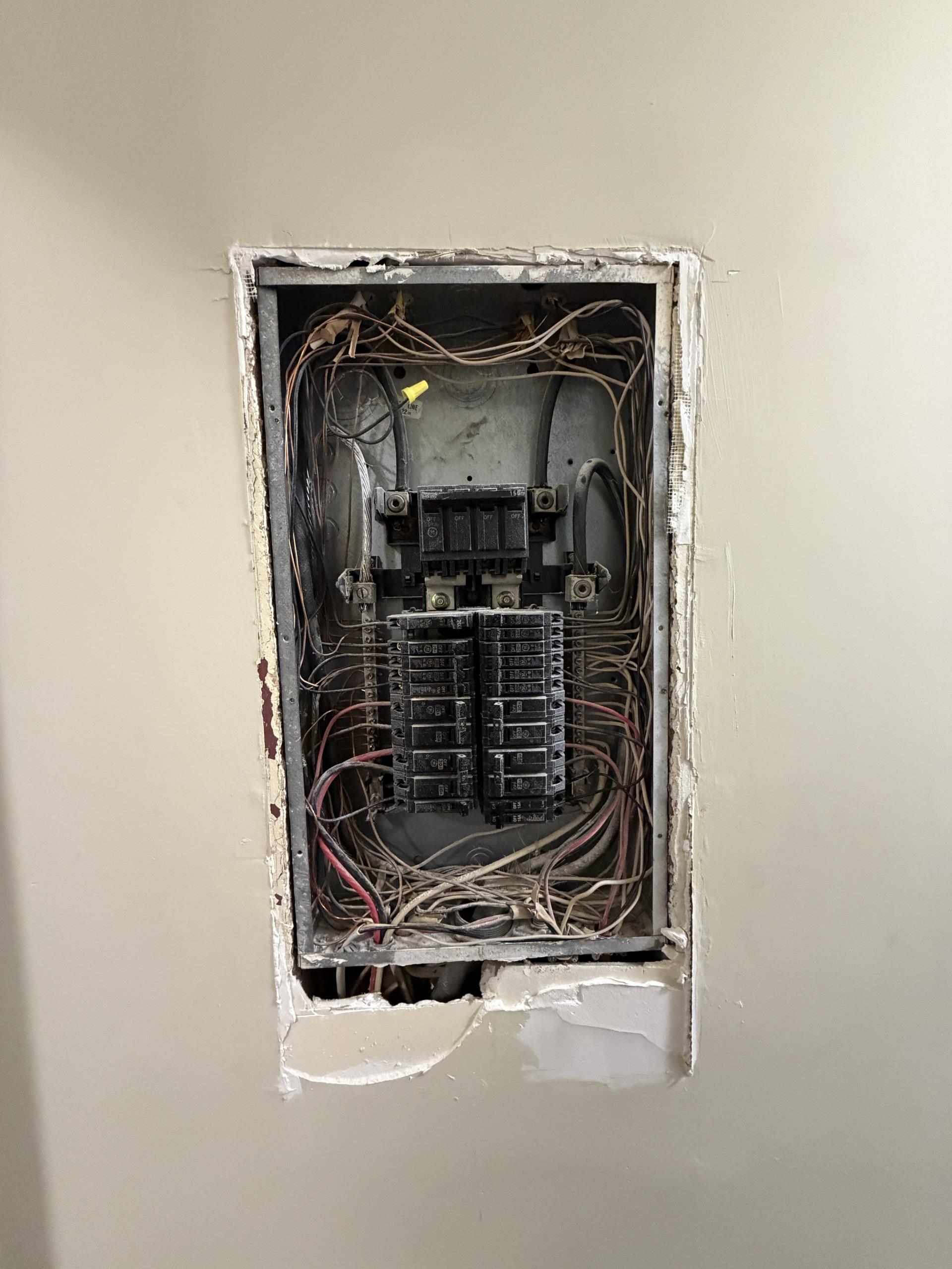 I conducted a thorough inspection of the electrical panel due to customer concerns about the circuit breakers. The inspection revealed a burnt bus bar beneath the main breaker, rendering the panel unsafe. Replacing individual breakers wouldn't resolve the issue. I recommended replacing the entire panel with a new, code-compliant load center and properly sized circuit breakers. All new breaker terminations were completed according to current NEC standards to ensure a safe and reliable electrical system.