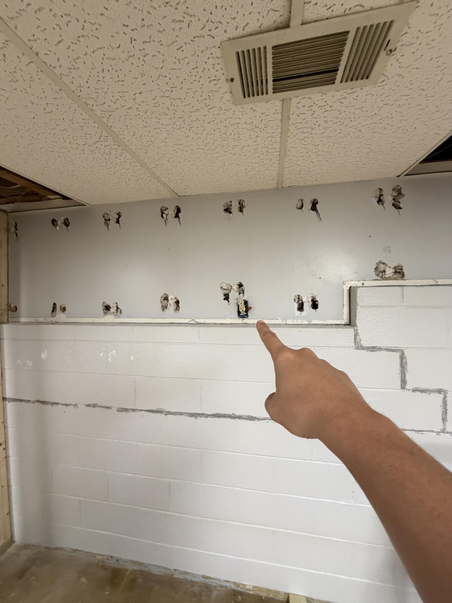 We installed a 100-amp subpanel to enhance circuit capacity, ensuring all terminations, labeling, and testing met safety and code standards. We extended branch circuits to add two back-to-back receptacles, a single receptacle over a door, and dedicated circuits for the refrigerator, electric range, and microwave. A small appliance circuit with a GFCI receptacle was also installed, along with new receptacles for the sump pump and exhaust fans/lights in the toilet and shower areas. Vanity lighting and a ceiling fan were added, and a movie theater light fixture was installed. Ten recessed LED lights were installed in the kitchen, and new switch locations were created for various fixtures. Finally, three Type 1 surge protectors were installed to safeguard the electrical system.