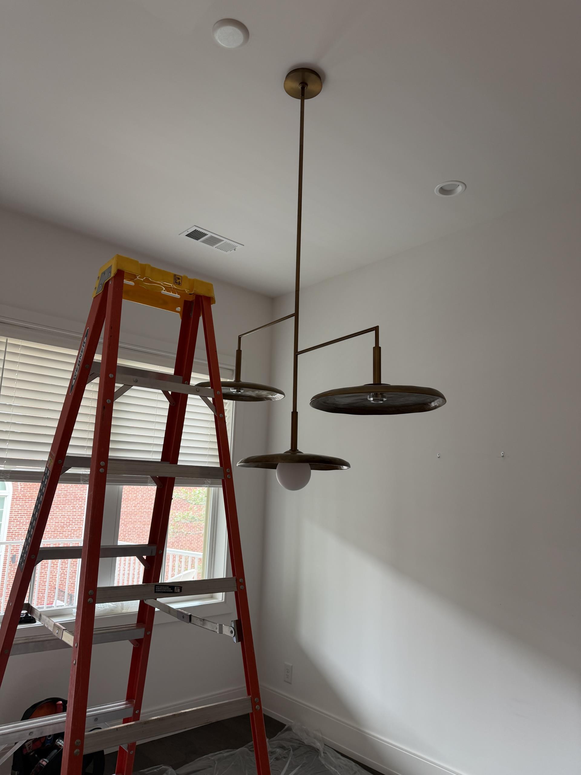 We carefully removed the old light fixture, ensuring no damage to the surrounding area. The original junction box was safely capped off to prevent any electrical hazards. A new junction box was installed at the desired location, and the wiring was meticulously rerouted to accommodate the new setup. The customer-supplied light fixture was then installed, with all connections securely fastened. Each connection was thoroughly tested to ensure proper operation, and the fixture was verified to be functioning correctly. The job was completed to the highest standards of safety and quality.