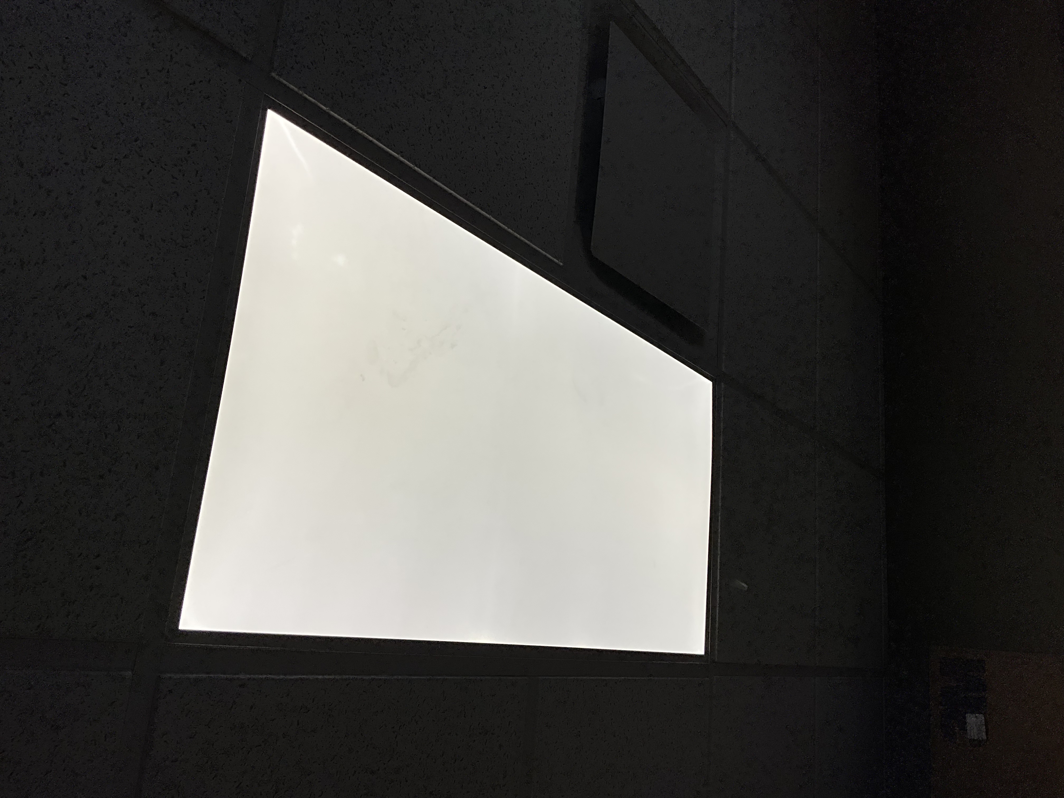 Upon arrival, the existing LED flat panel light fixture was assessed due to intermittent operation and occasional flickering. During diagnostics, the fixture was observed flickering while energized but remained functional. The intermittent nature of the issue indicated an internal failure within the fixture and/or integrated LED driver. The replacement involved removing the existing fixture, installing a new LED flat panel fixture of comparable size and color temperature, and reconnecting it to the existing electrical wiring. The new fixture was secured in its current location, and thorough testing was conducted to ensure proper operation and normal performance. All electrical connections were verified, and the new fixture was confirmed to be fully functional before completion.