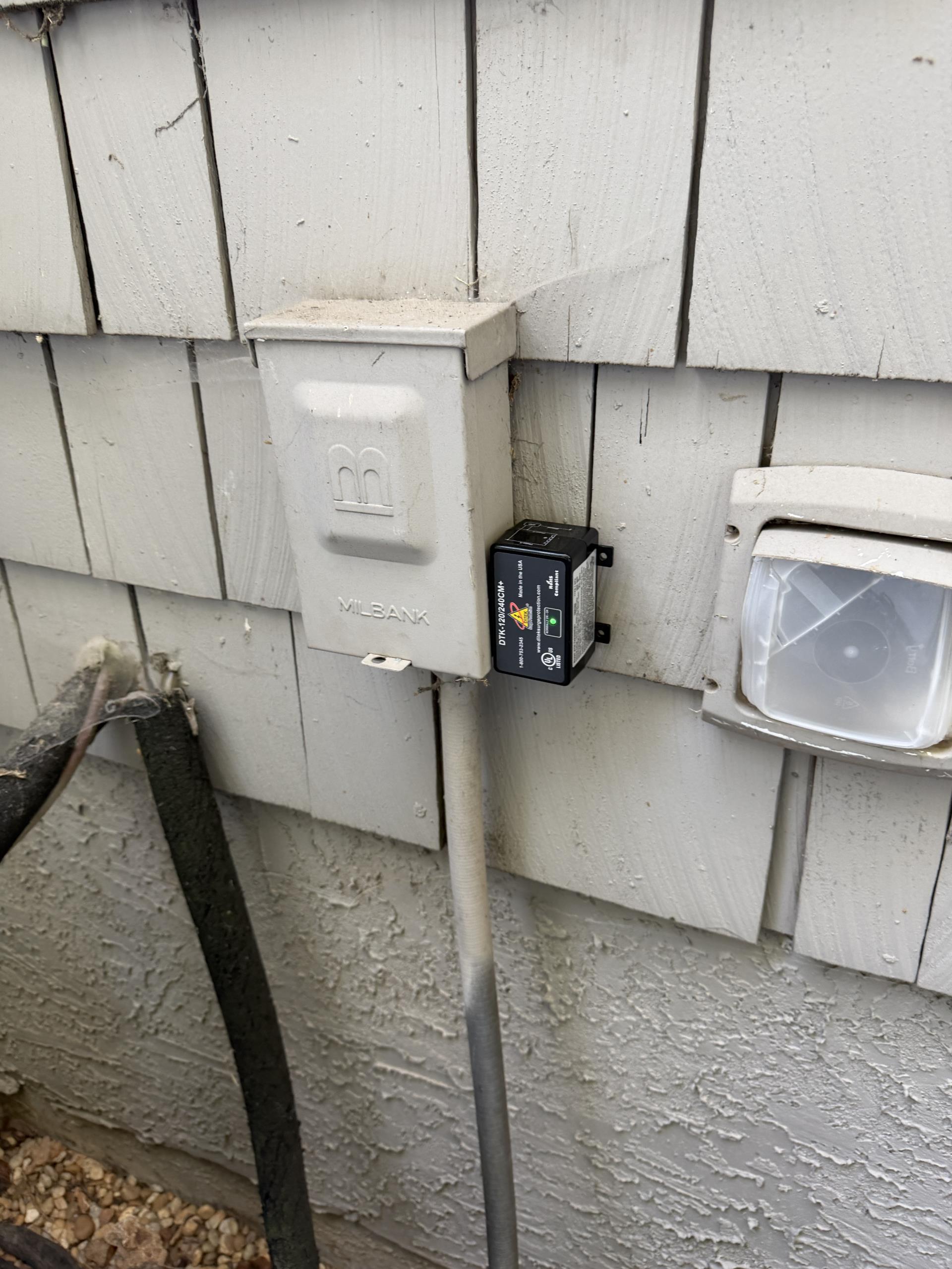 We installed three 240-volt high voltage surge protectors for the AC condensing unit or heat pump. Additionally, we installed a new Type 1 service entrance rated 120/240 Volt High Voltage Surge Protector, ensuring compliance with National Electric Code 230.67, which may have required upgrades to the existing grounding electrode system. We also installed a 220-240 volt, 15-50 amp double pole circuit breaker, connecting it to the existing branch circuit wiring and busbar, and performed a full panel inspection. Furthermore, we replaced an existing exhaust fan with a new one, connecting it to the existing discharge duct and switched electrical feed. Lastly, we installed seven 120-volt combo smoke/carbon detectors, connecting them to the existing wiring.