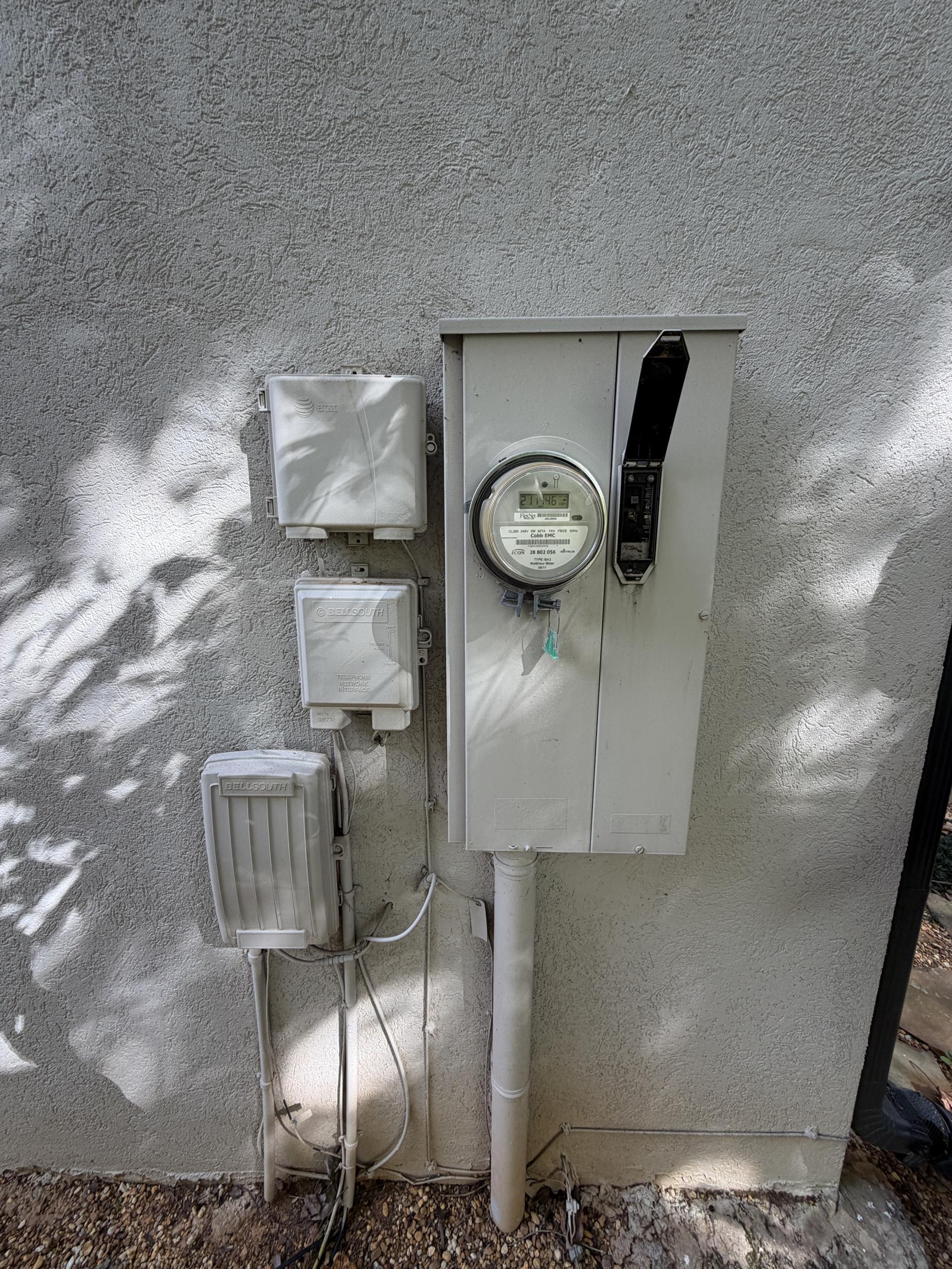 We replaced the outdated 36-year-old electrical panel with a new one, ensuring it was appropriately sized for current needs. The old panel was removed, and the new one was installed with properly sized circuit breakers. Existing branch circuits were reconnected, and the wiring was organized and labeled for clarity. A 50-amp generator interlock system was installed, including a listed interlock kit, a 50-amp generator breaker, and a 50-amp exterior generator inlet with necessary wiring. The interlock was configured to prevent simultaneous operation of the utility main and generator breakers. Whole-home surge protection was added, and grounding and bonding were verified and corrected as needed. The installation was tested, and we reviewed safe generator connection practices, load management, and interlock operation with the homeowner, ensuring compliance with all applicable electrical codes and local inspection requirements.