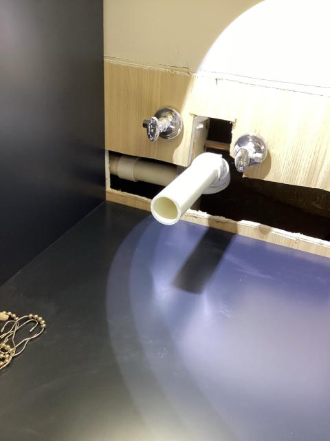 Reconnected the kitchen sink.  Moved drain piping for new vanity cabinet