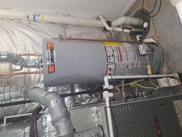 Installed new 50 gal Stat Natural Gas water heater, replaced 2 shut off valves and hose bibs