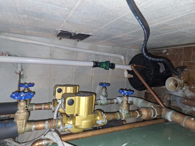 installed Zoeller bucket pump for AC condensation line and boiler