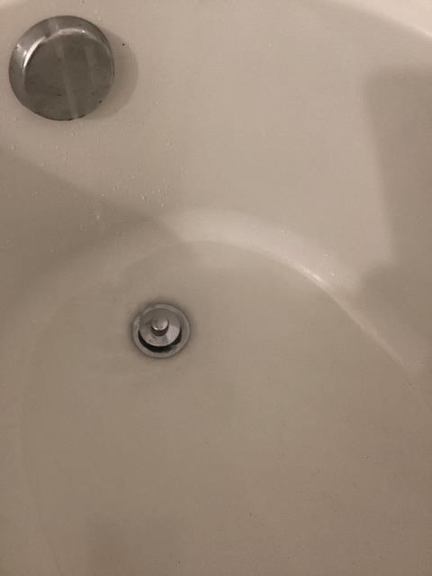 Removed blockage from tub drain.  Tightened kitchen faucet Removed blockage from tub drain.  Tightened kitchen faucet
